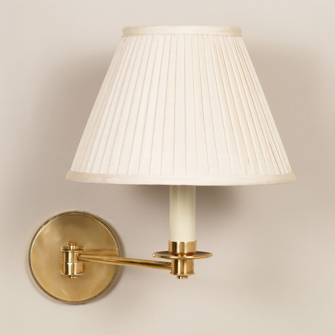 Cromer Swing Arm wall light in brass with 10" empire knife pleat shade in cream silk