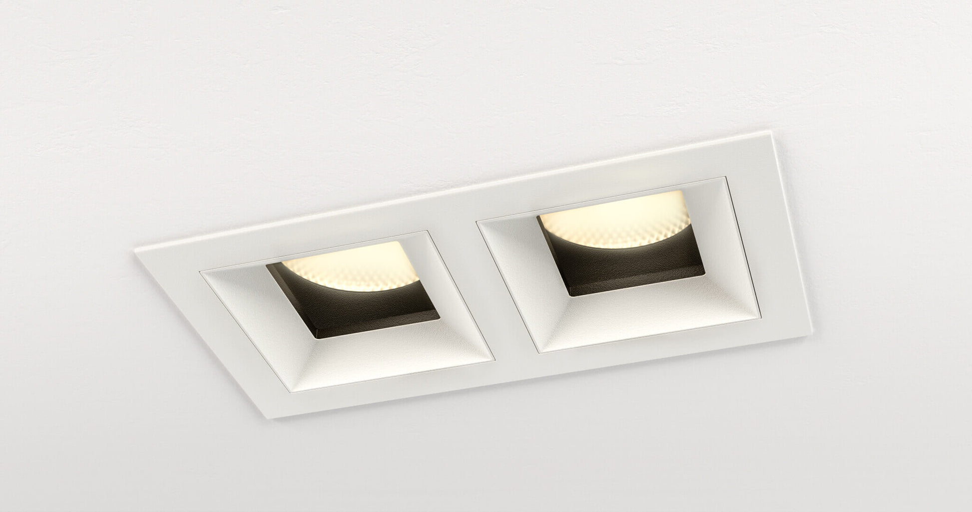 Riva Twin adjustable LED downlight in a white ceiling