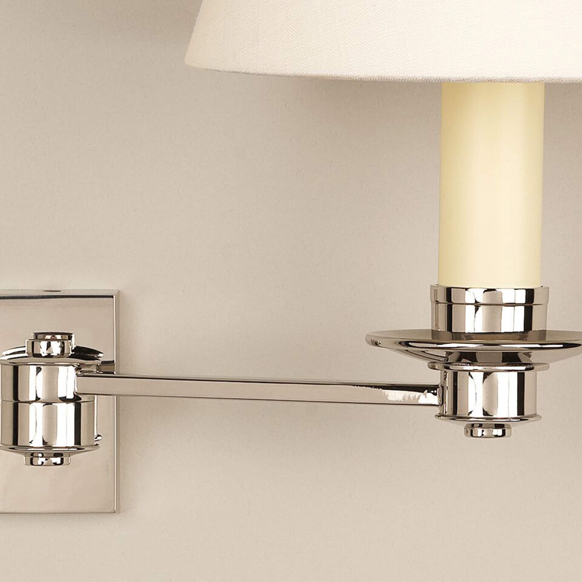 Close up of library swing arm wall light in nickel