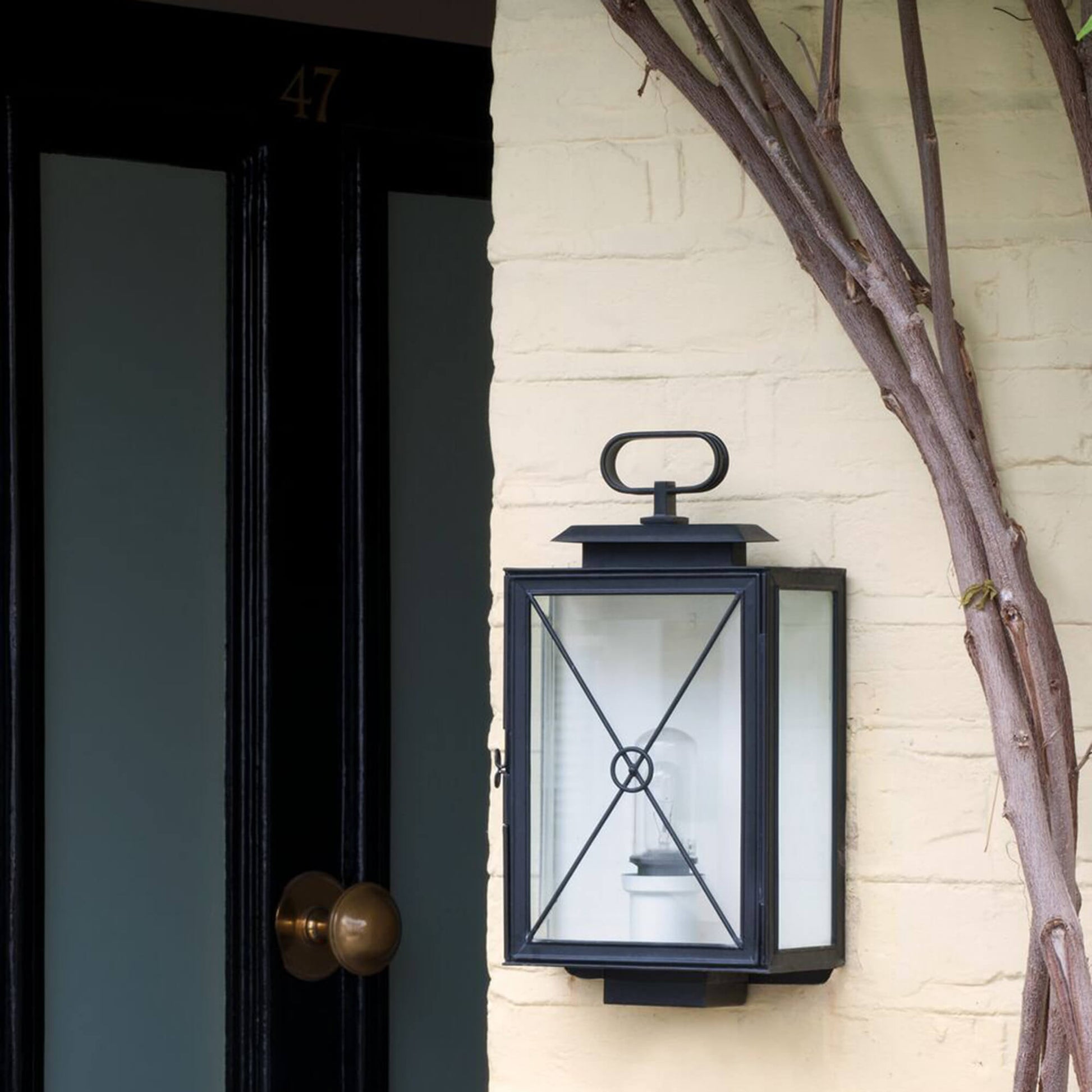 Exterior Richmond wall light mounted on the front of a house