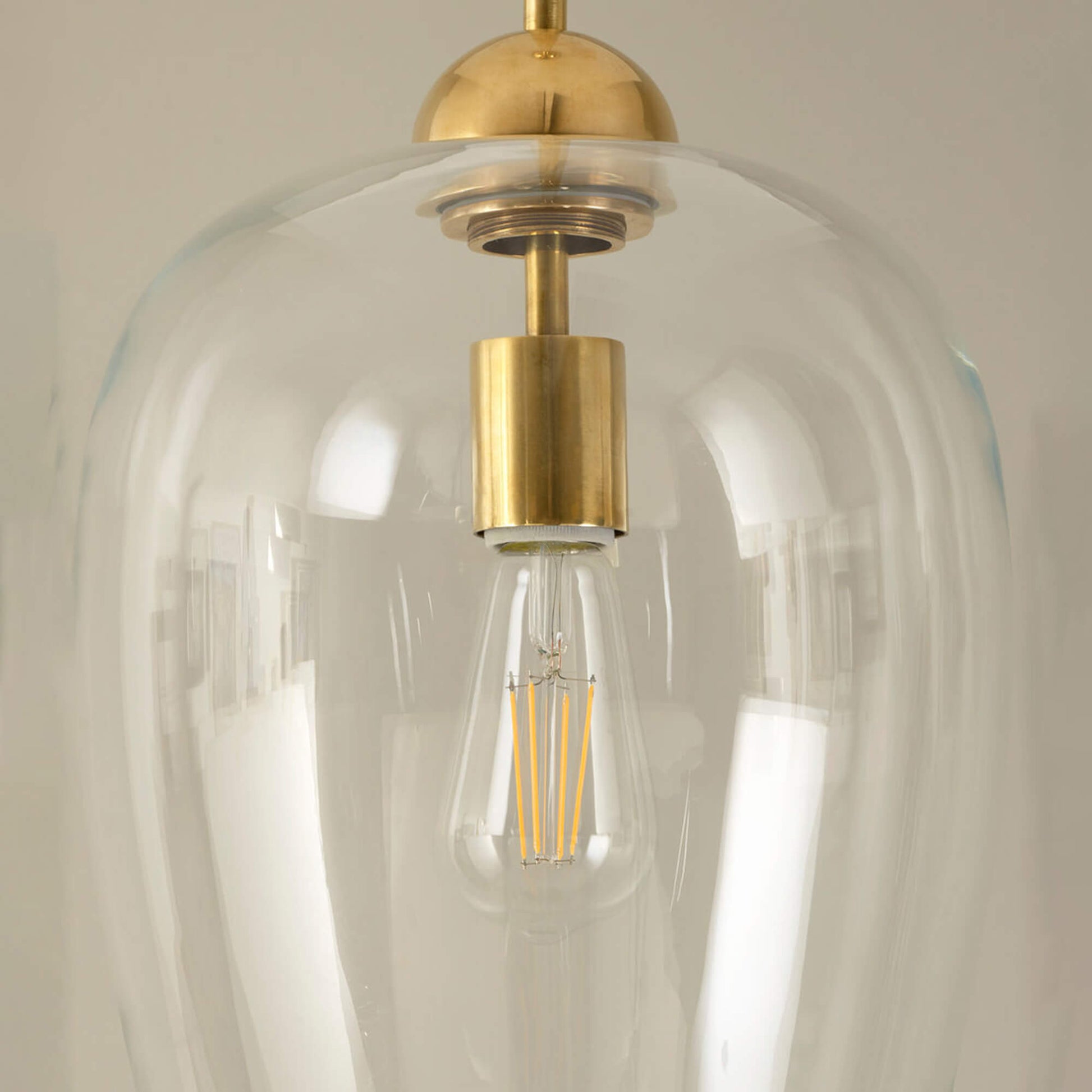 Close up of brass Stepney pendant