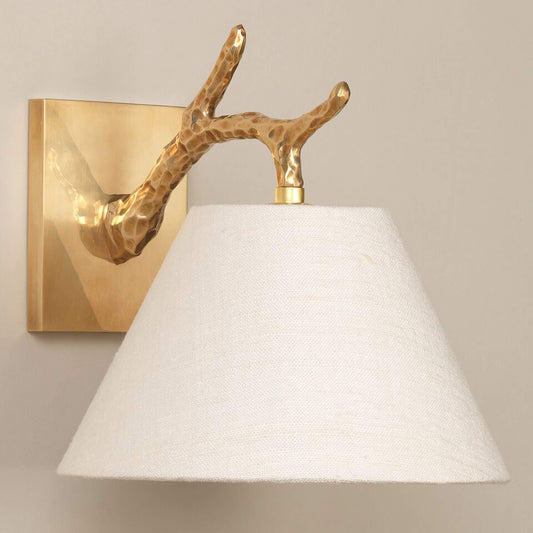 Twig Down wall light in brass with lily linen shade