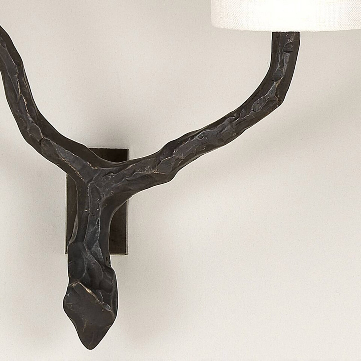 Close up of Twig 2 arm wall light bronze with narrow backplate